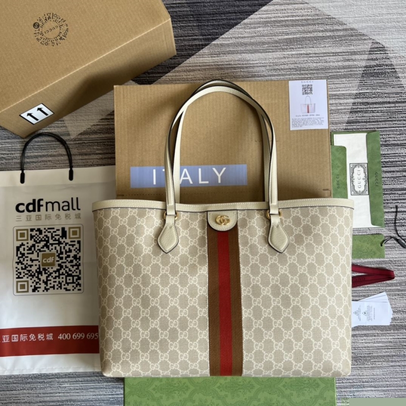 G*u*i shopping bags